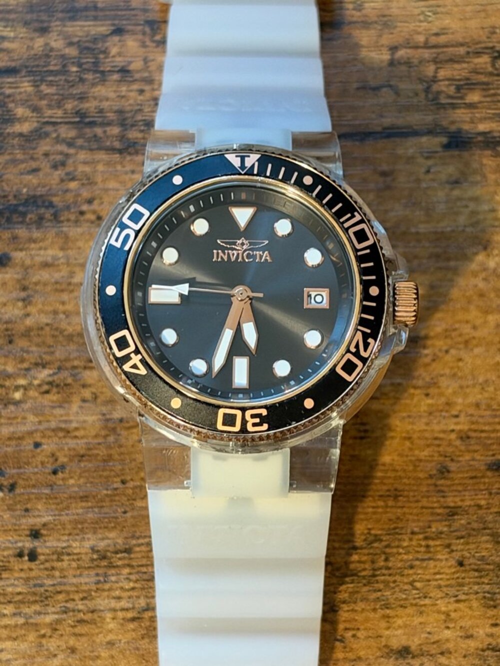 Invicta 37306 Quartz Clear Case Black Dial Rose Gold Accents 39mm 100M